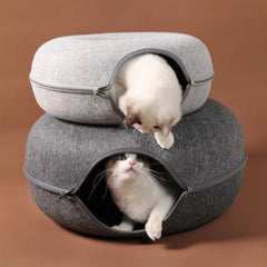 Donut-shaped cat bed with an interactive tunnel made of felt, ideal for kitten training, play, and resting indoors.