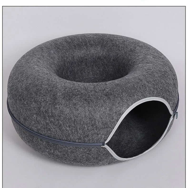 Donut-shaped cat bed with an interactive tunnel made of felt, ideal for kitten training, play, and resting indoors.