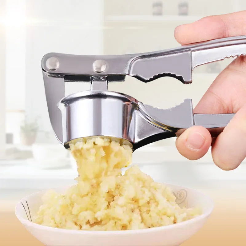 Stainless steel garlic press crusher and mincer for easy garlic grinding and manual squeezer use