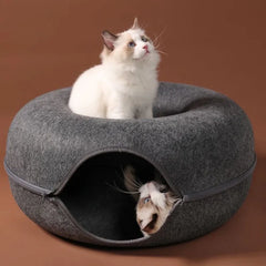 Donut-shaped cat bed with an interactive tunnel made of felt, ideal for kitten training, play, and resting indoors.