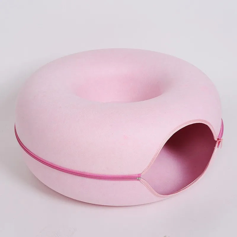 Donut-shaped cat bed with an interactive tunnel made of felt, ideal for kitten training, play, and resting indoors.