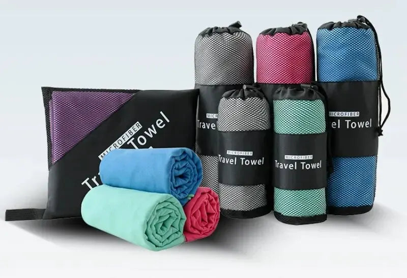 Quick-drying sports towel in blue, grey, green, and orange for gym, swimming, fitness, and outdoor activities