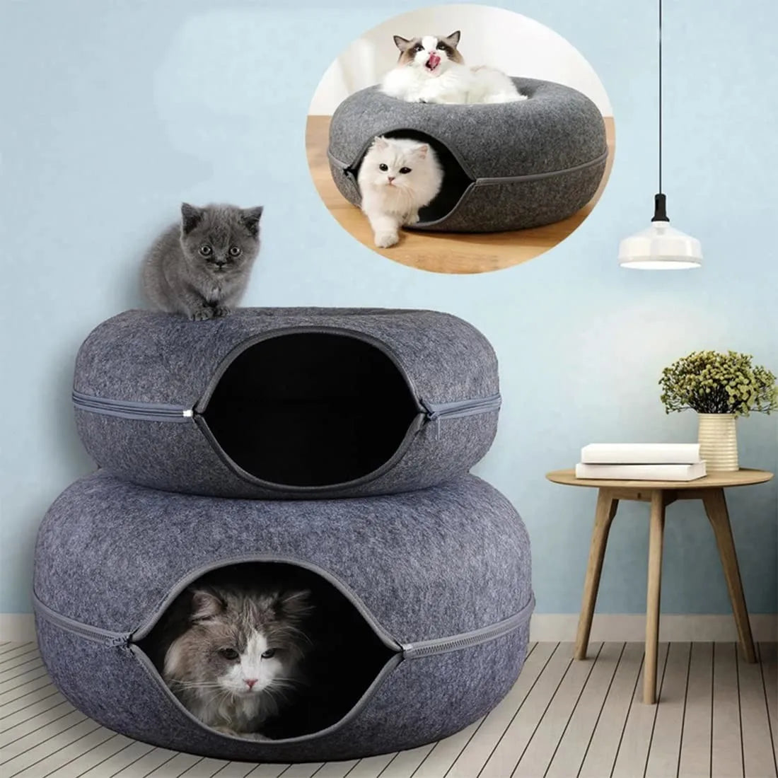 Donut-shaped cat bed with an interactive tunnel made of felt, ideal for kitten training, play, and resting indoors.