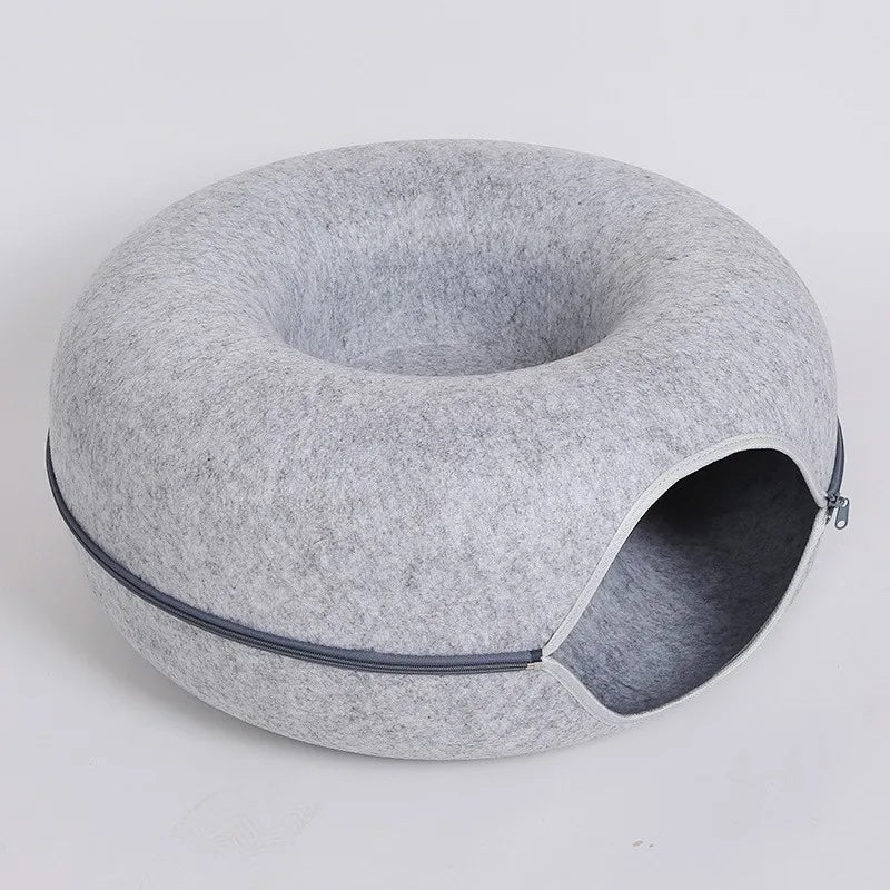 Donut-shaped cat bed with an interactive tunnel made of felt, ideal for kitten training, play, and resting indoors.