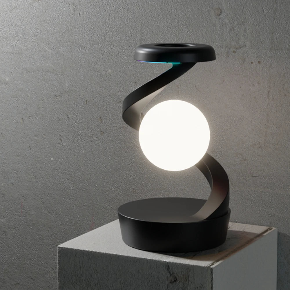 A modern creative table lamp with a rotating floating design, built-in 15W wireless charger for mobile phones, and RGB atmosphere night light for a cozy ambiance.